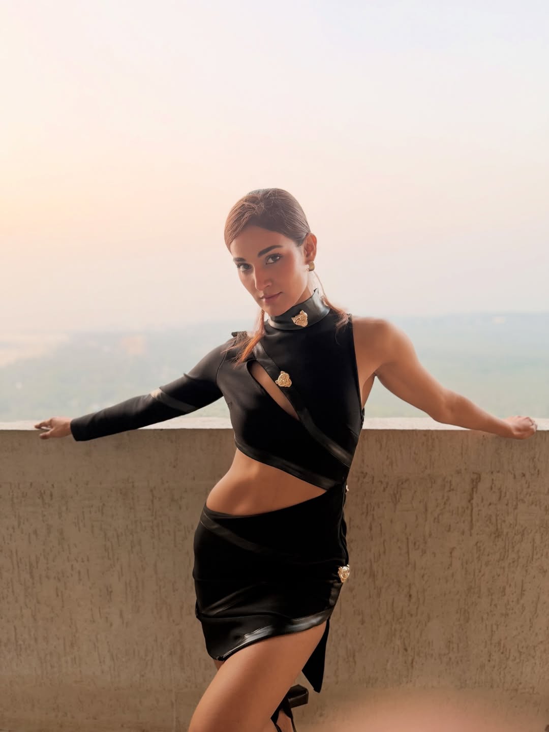 Mukti Mohan in daring black ensemble with sharp style