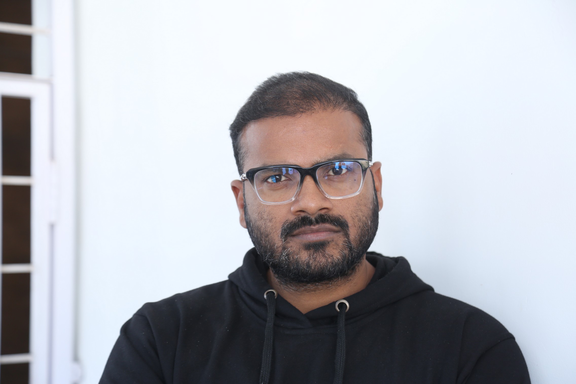 Muralikanth Devasoth in casual hoodie with glasses
