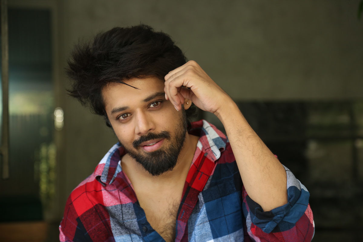 Nandu rocks casual chic style with plaid shirt
