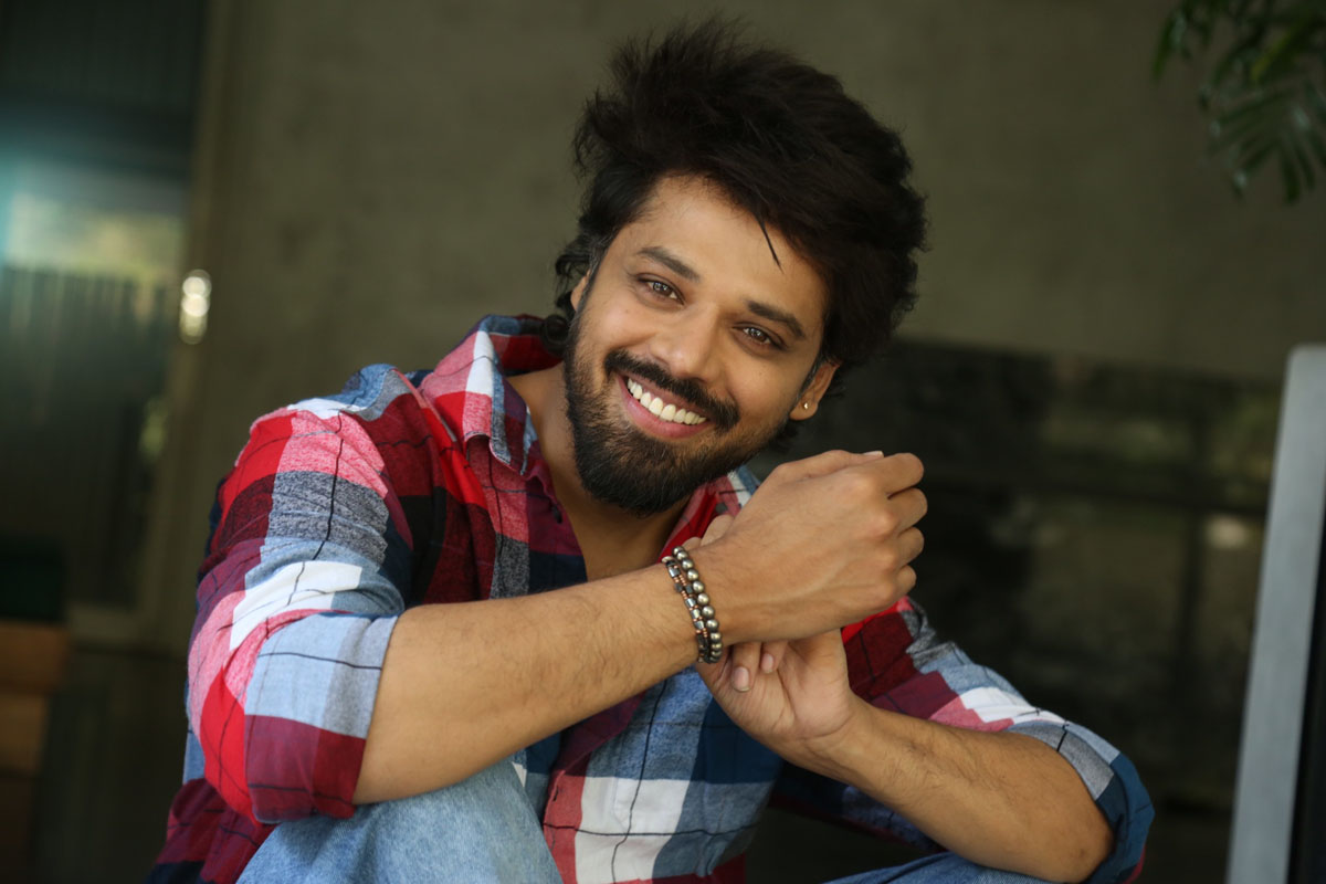 Nandu exudes charm in plaid shirt and smile