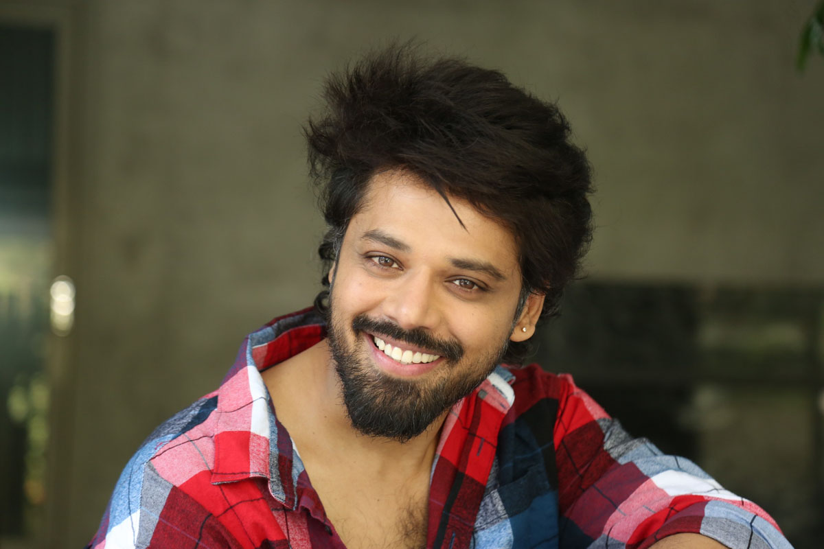 Nandu shines with tousled hair and plaid style