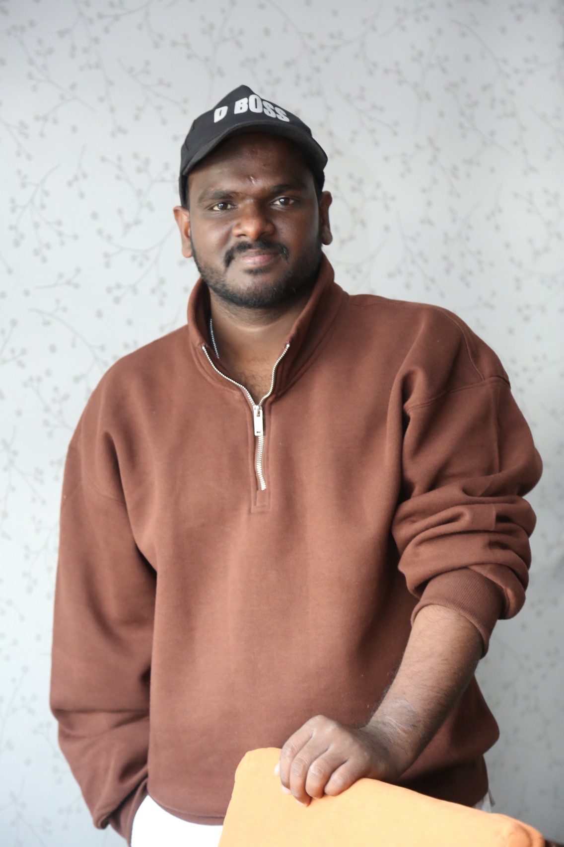 Nanduri Emmanuel casual boss vibe in zip up sweater