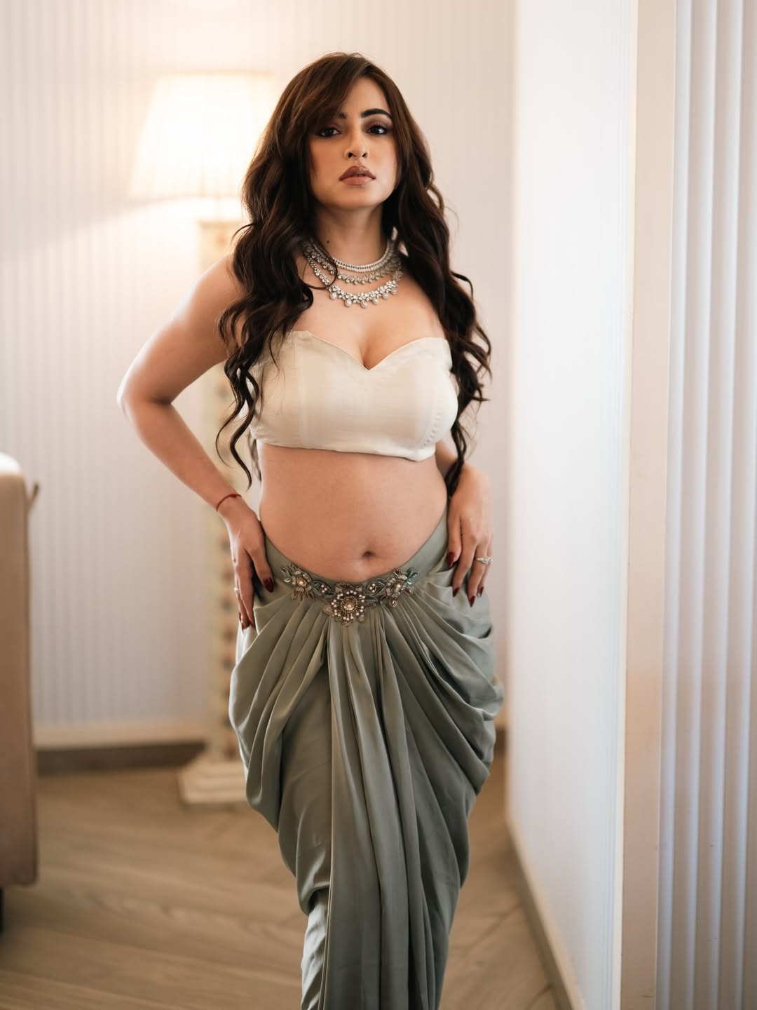 Saree Styling: A Symphony of Muted Tones and Luxurious Detail