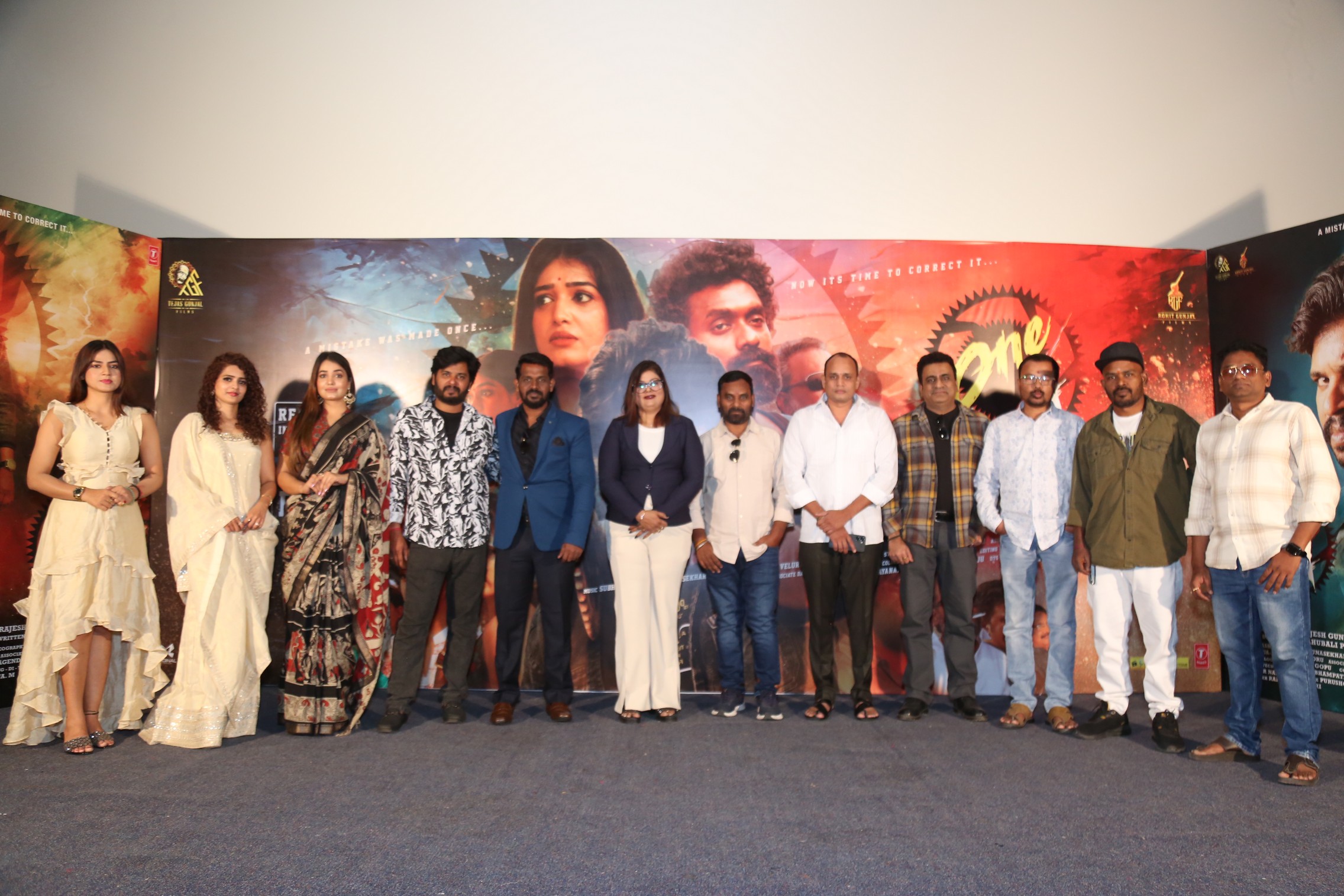 Team and guests posing for media