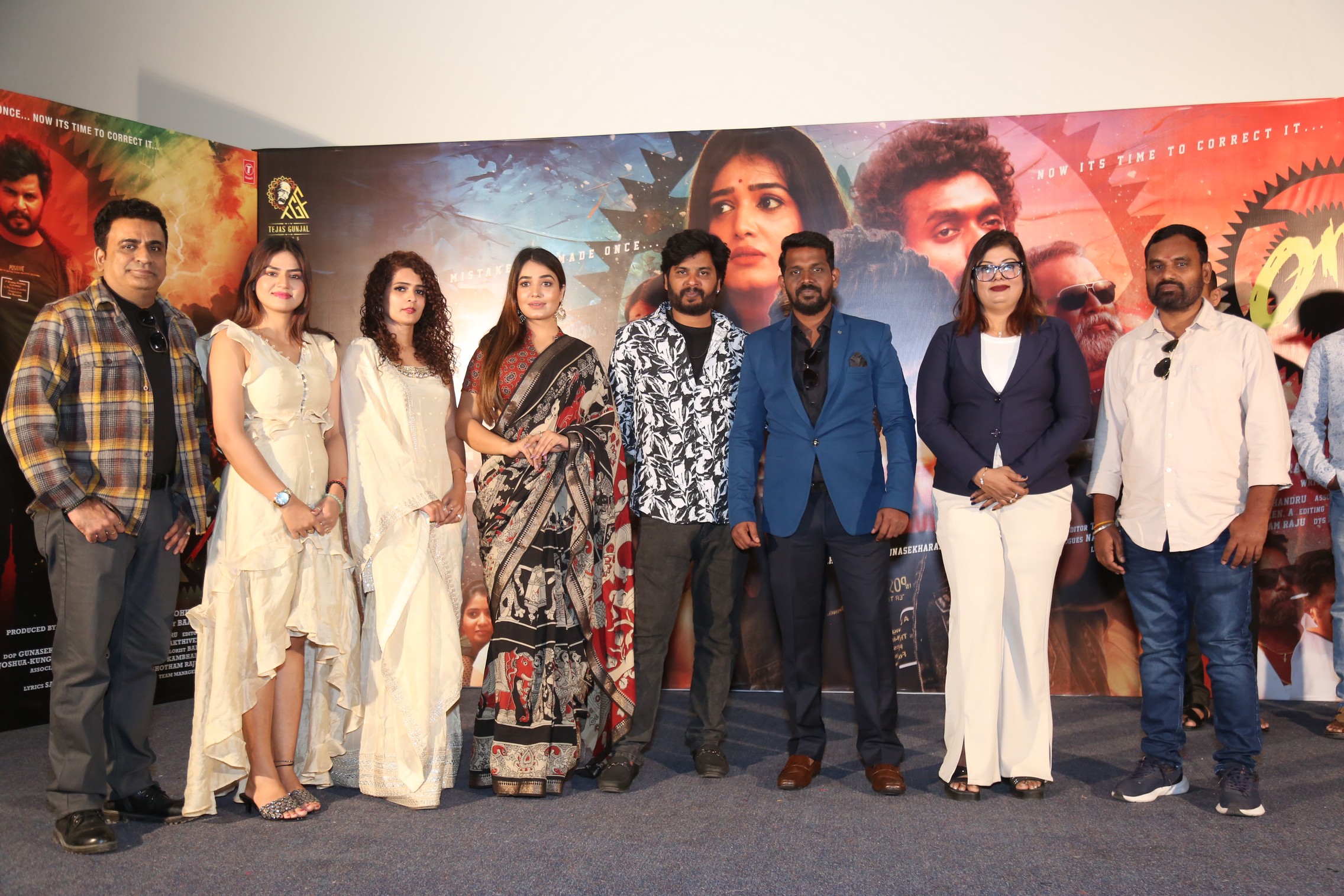 Cast and producers posing together