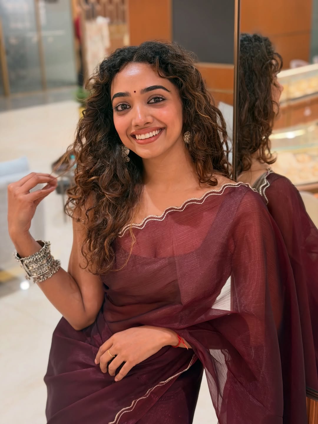Saanve Megghana stunning in maroon saree with confidence