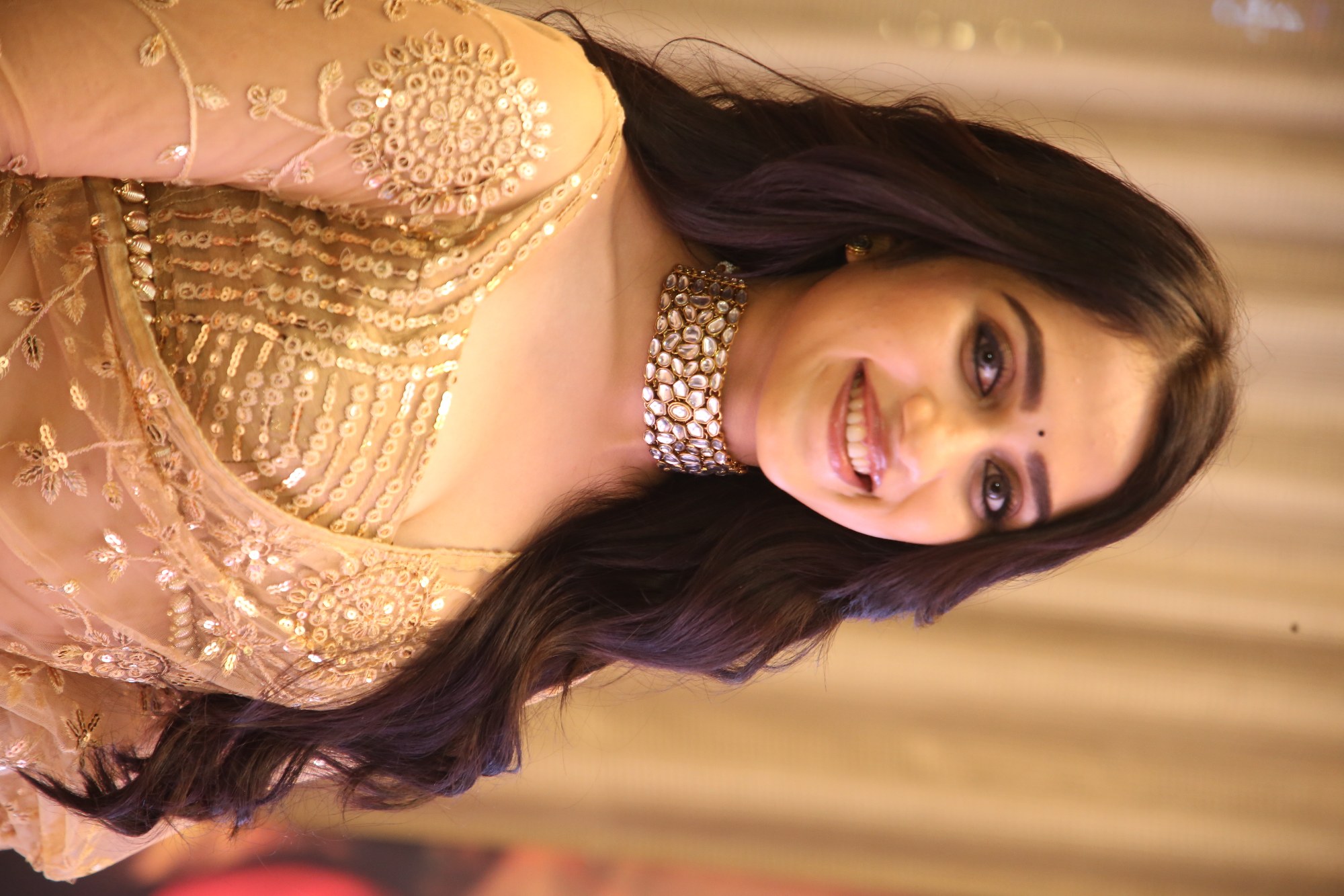 Sakshi Sagar Mhadolkar glowing in elegant golden style