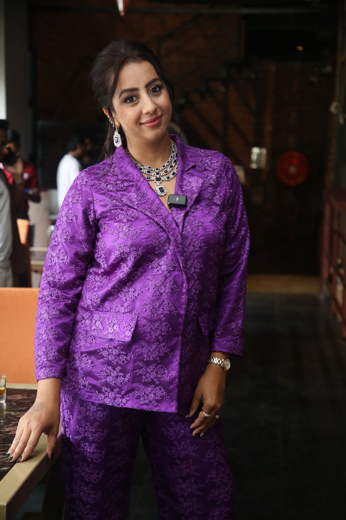 Sanjjanaa Galrani striking violet style with regal charm