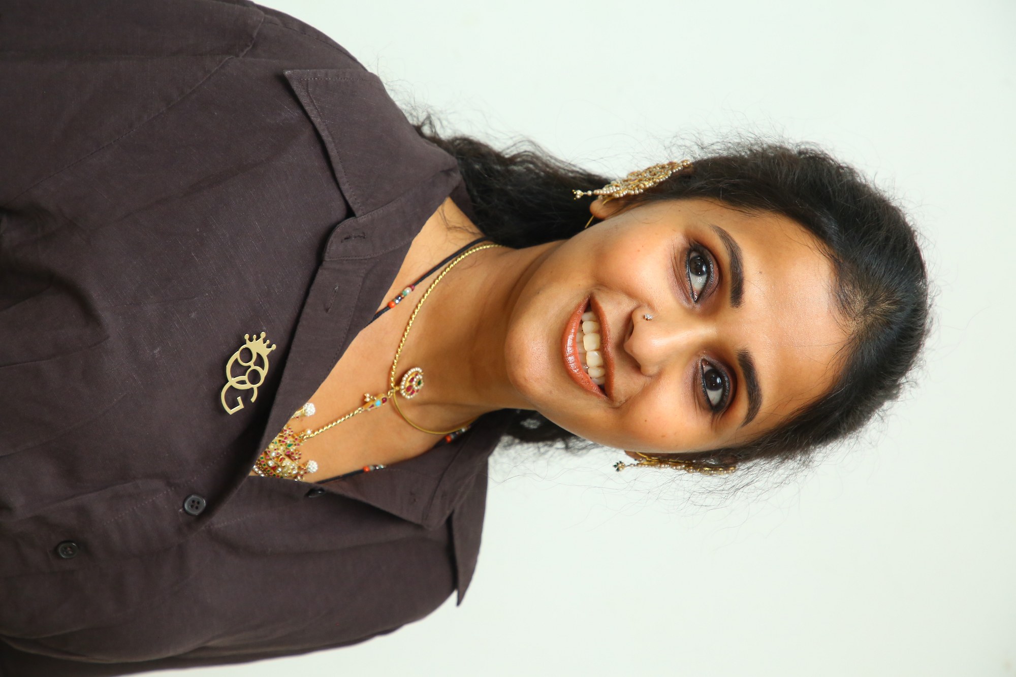 Smitha radiating confidence in vibrant professional style