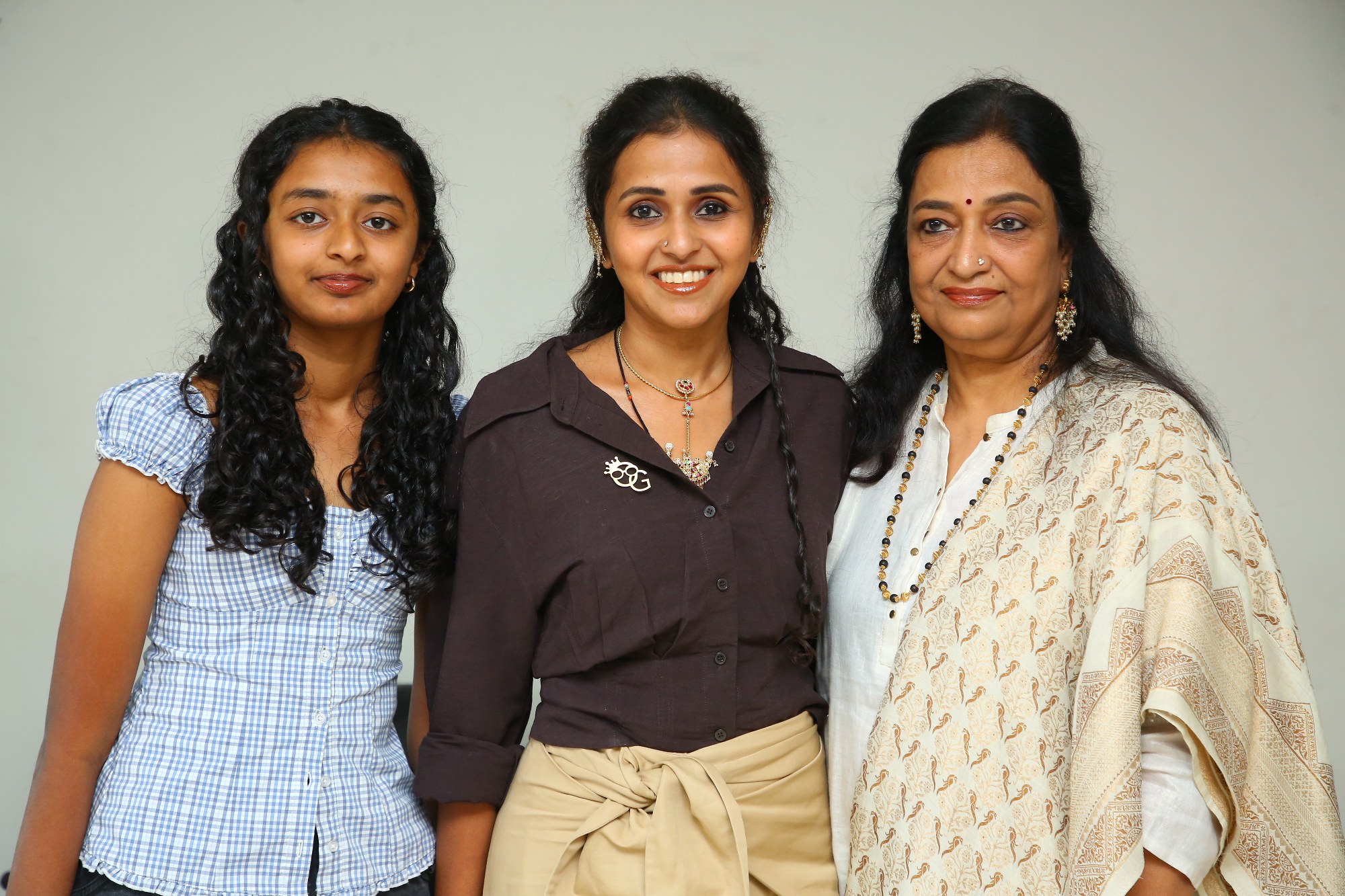 Smitha with family at song launch event