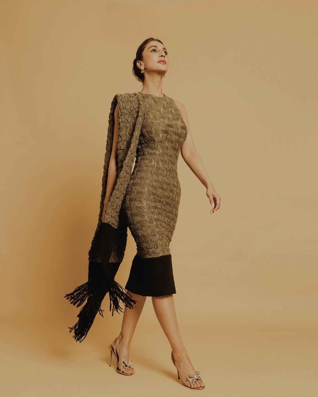 Vaani Kapoor striking in gold and black sophistication