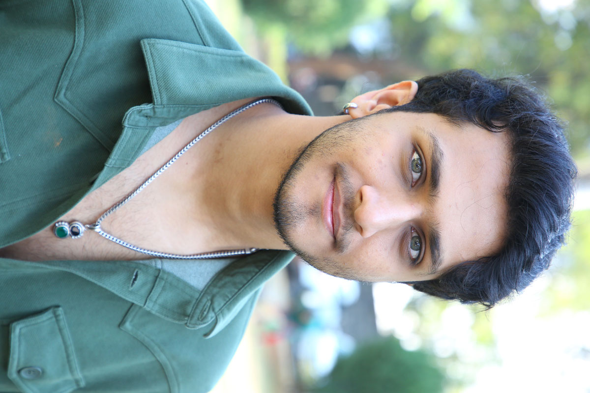 Samarjit Lankesh posing for media cameras