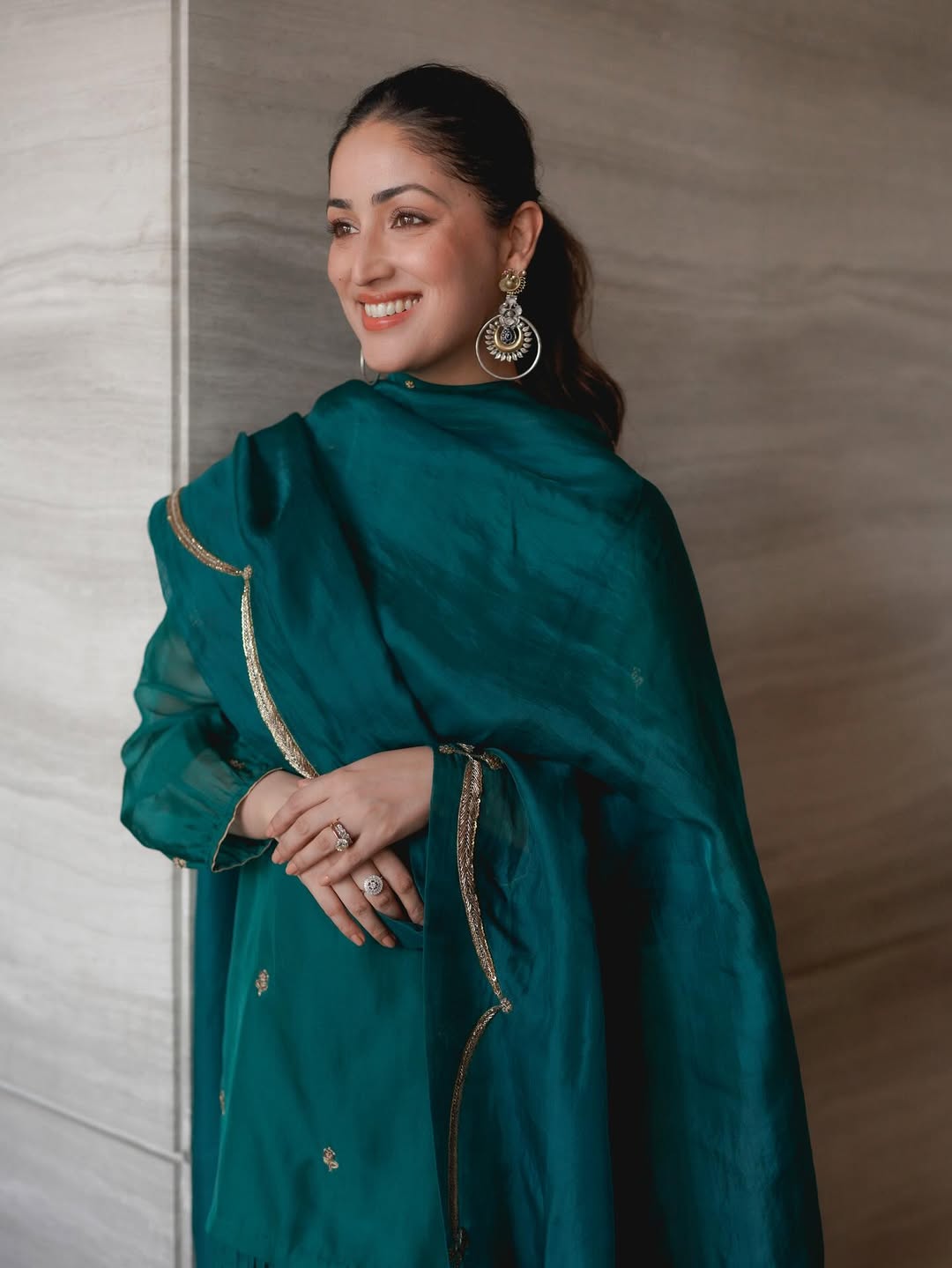 Yami Gautam radiant in teal ensemble with sparkle