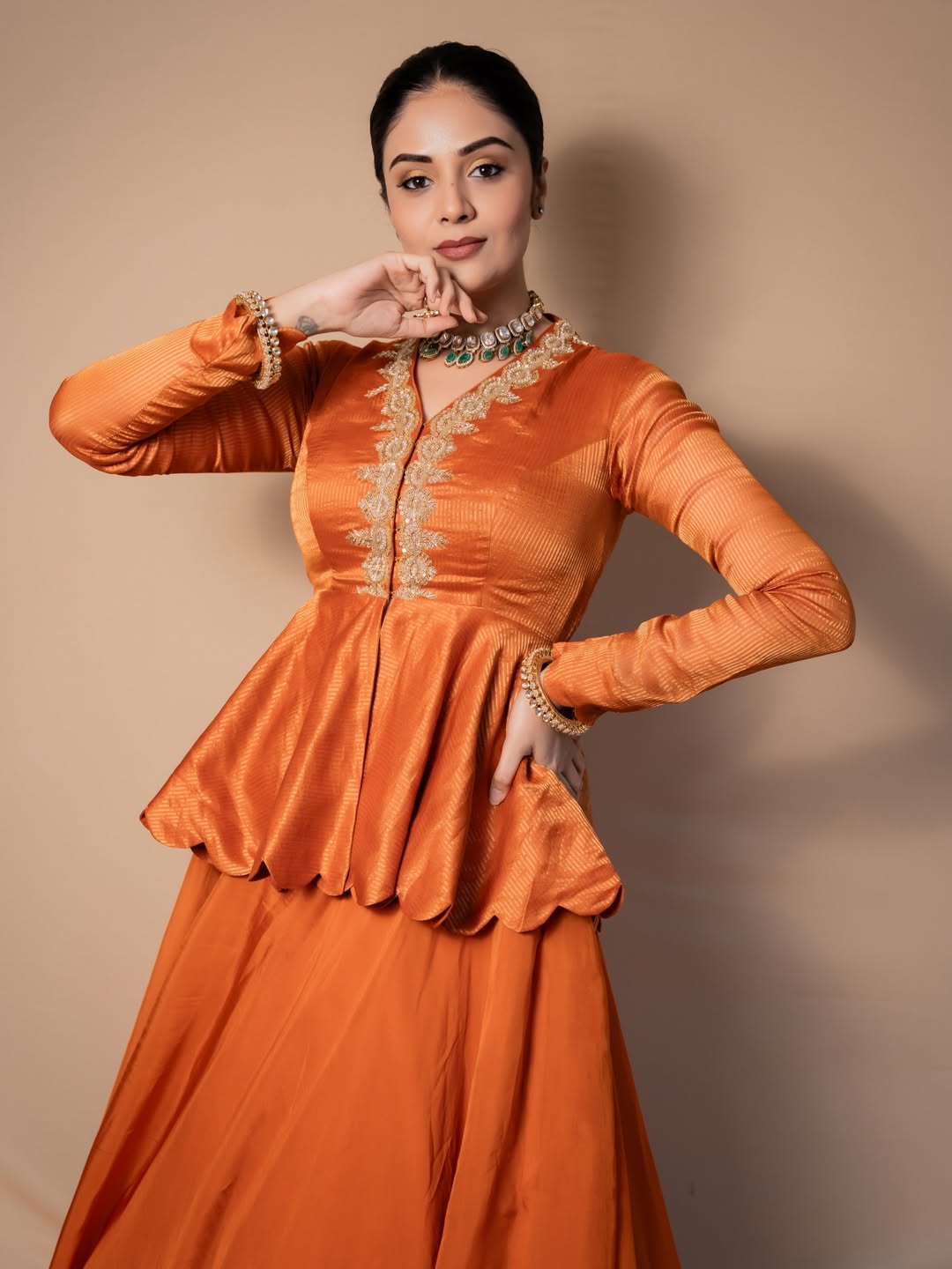 Sreemukhi makes bold statement in orange ensemble