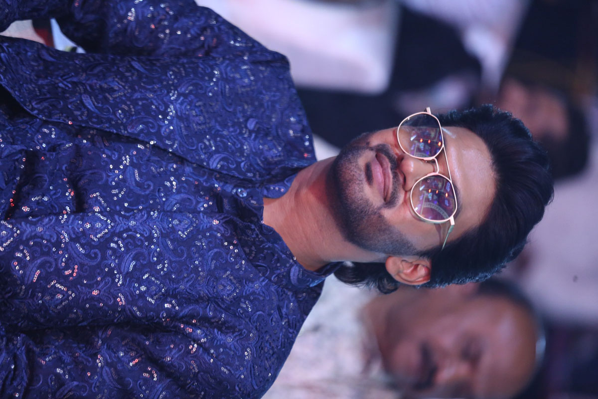 Naveen Polishetty standing out in dapper blue ensemble