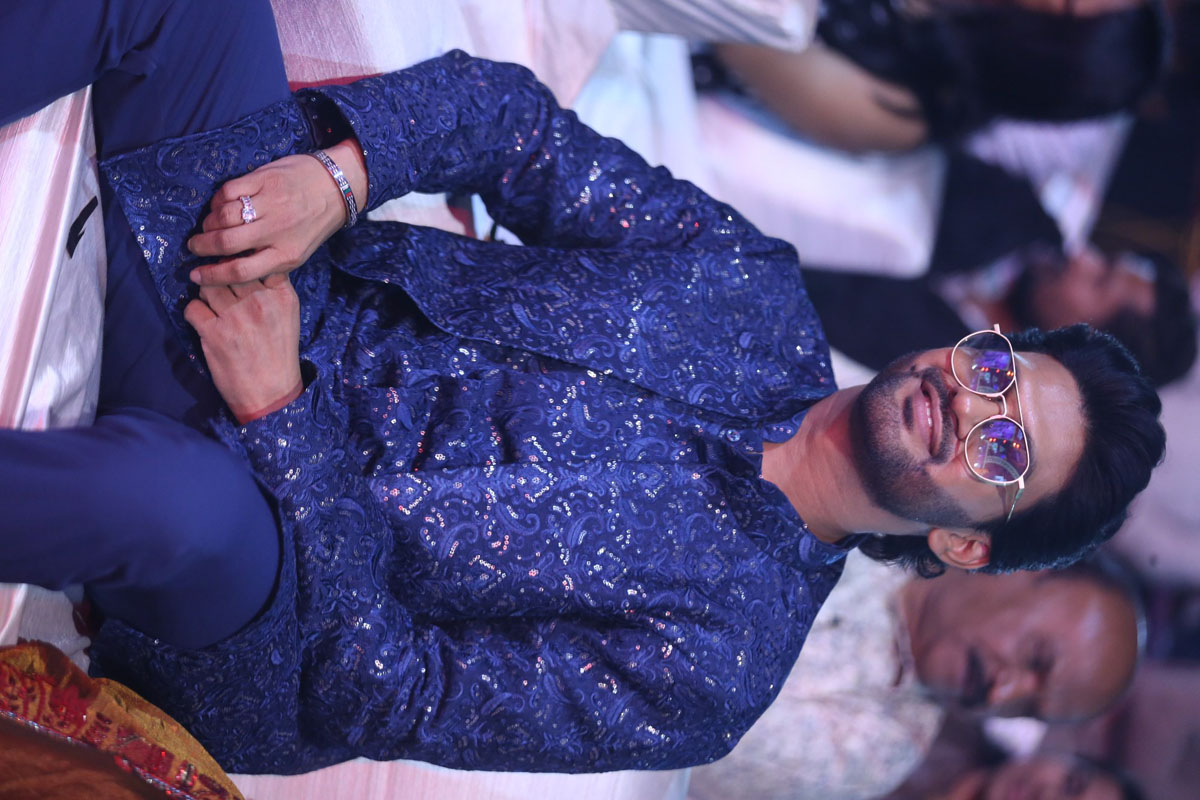 Naveen Polishetty showcasing sharp style with reflective shades