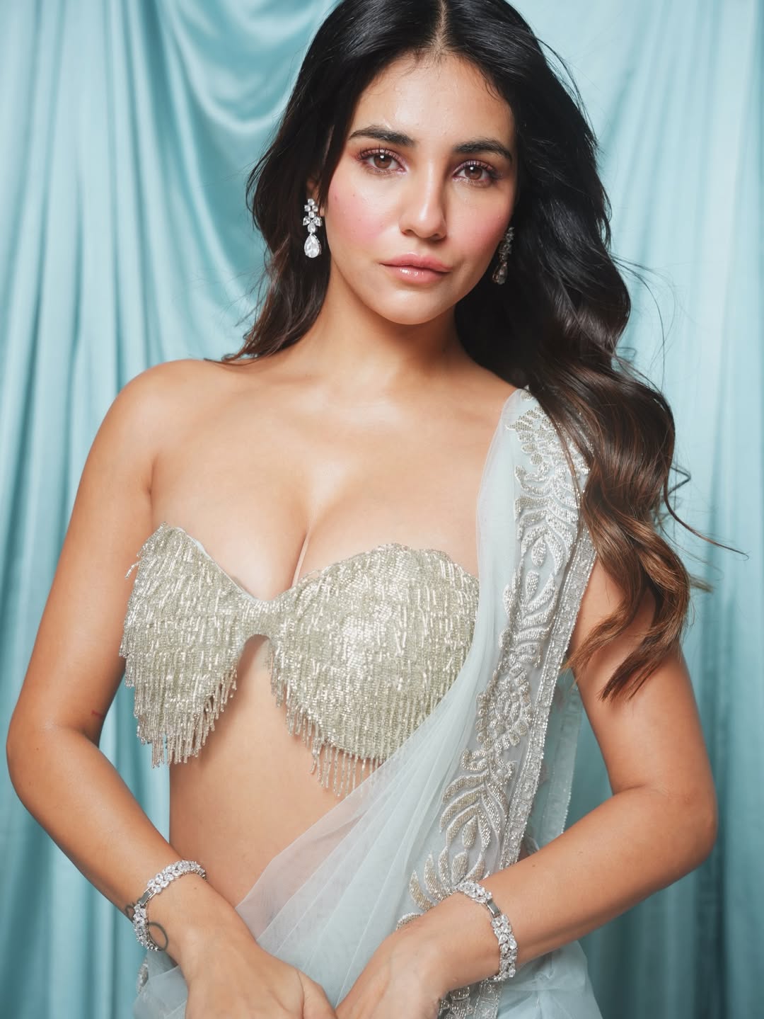 Radhika Seth in modern glamorous ethnic ensemble