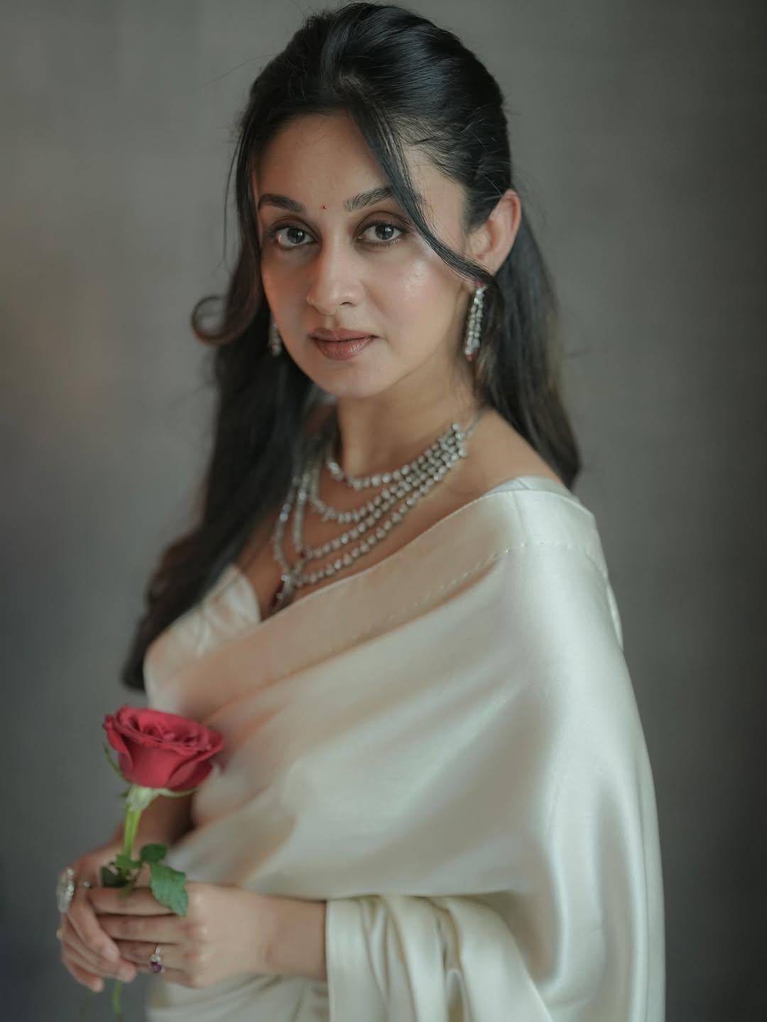 Aishwarya Arjun captivates with rose and timeless elegance