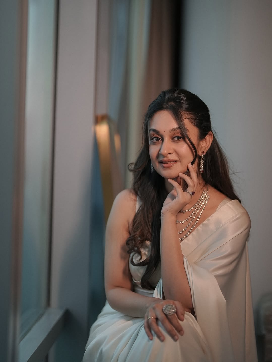 Aishwarya Arjun glows with elegance confidence and sparkle