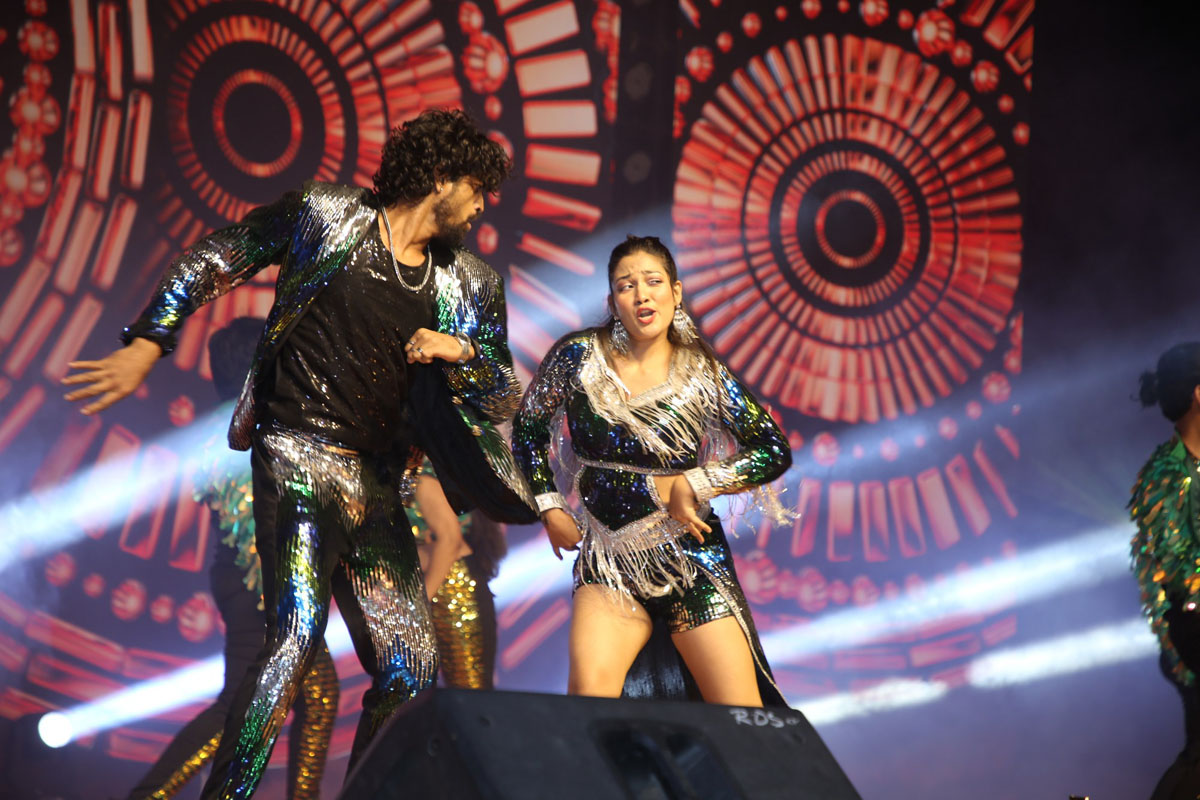 Dancer performing energetic stage act