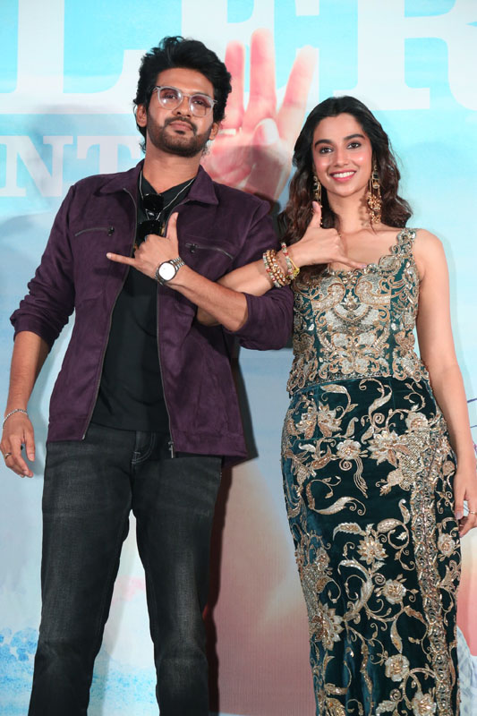 Naveen Polishetty and Meenakshi Chaudhary media pose