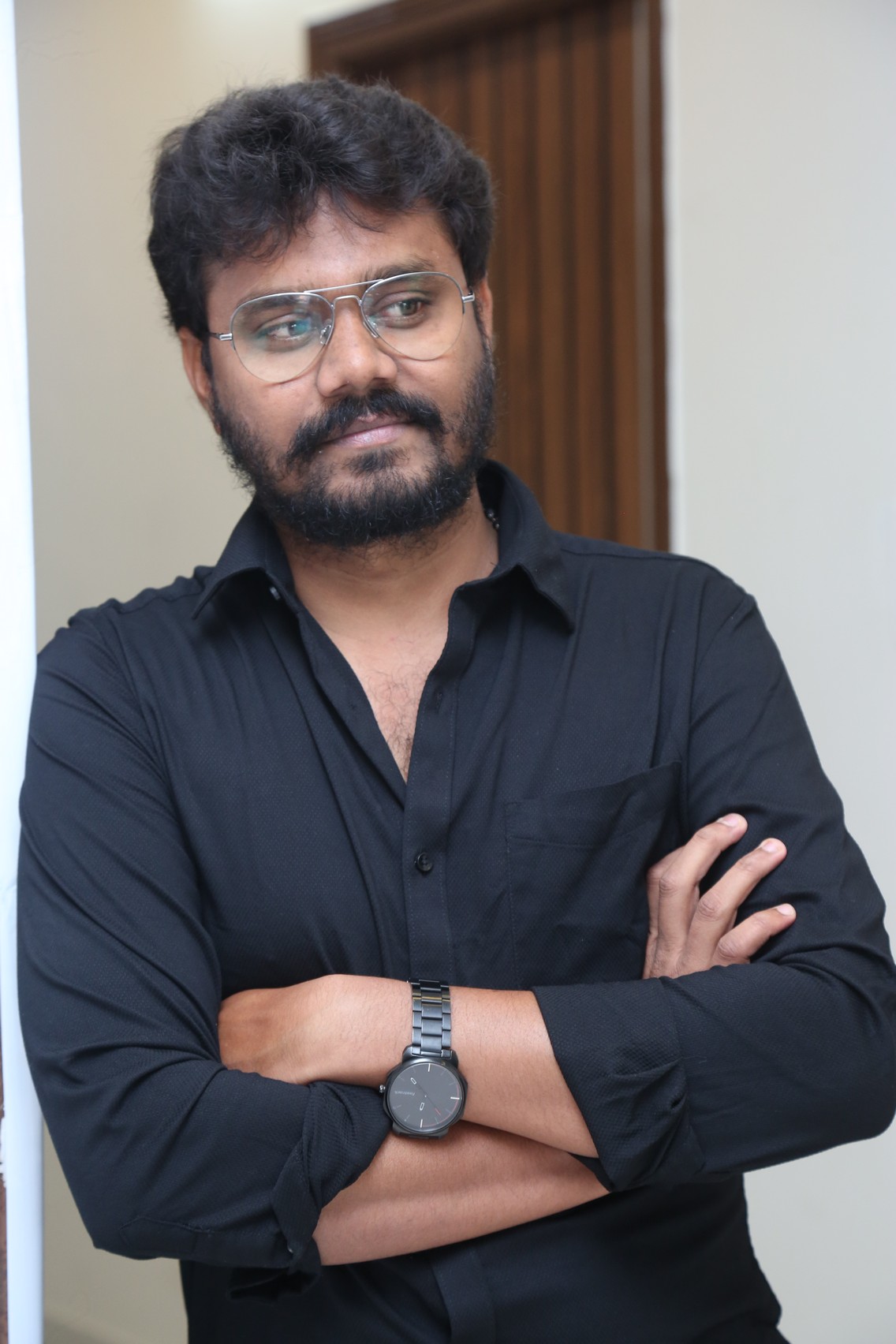 AR Sajeev understated elegance in black shirt