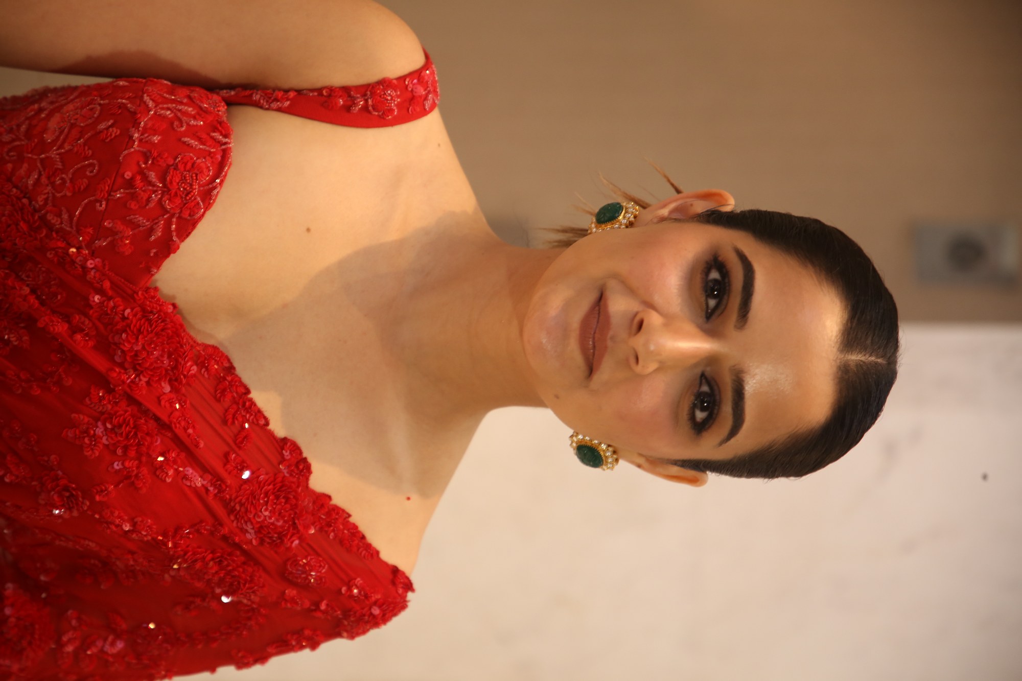 Ashika Ranganath stuns in bold red elegance