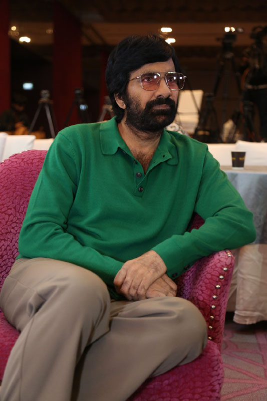 Ravi Teja seated at blockbuster meet