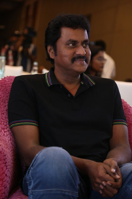 Actor Sunil seated at success meet