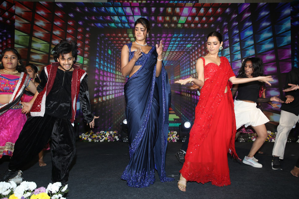Dimple Hayathi Ashika Ranganath dancing on stage at pre release event