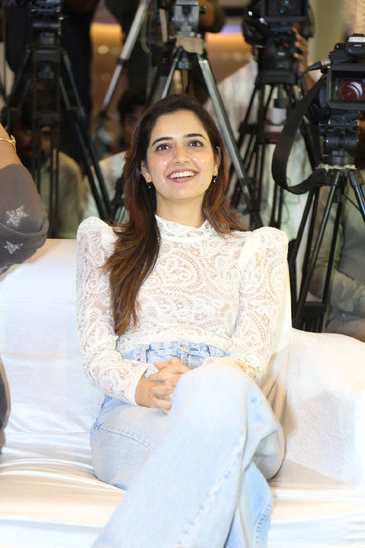 Ashika Ranganath laughing during movie success meet