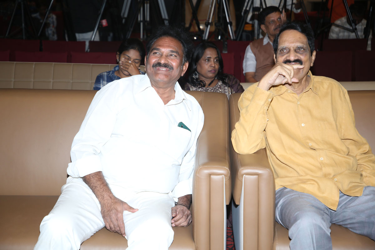 Film team posing together at event