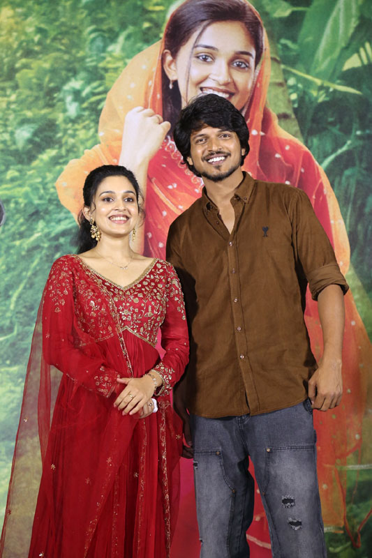 Nidhi Pradeep Sumanth Prabhas press pose