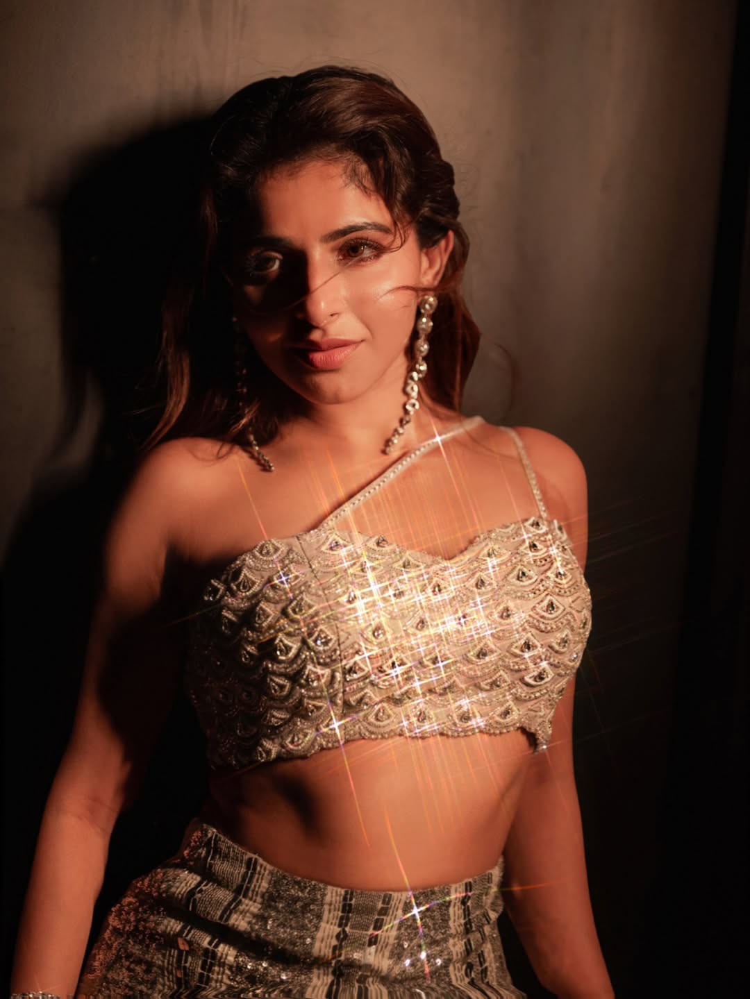 Iswarya Menon glamorous sparkle with playful attitude