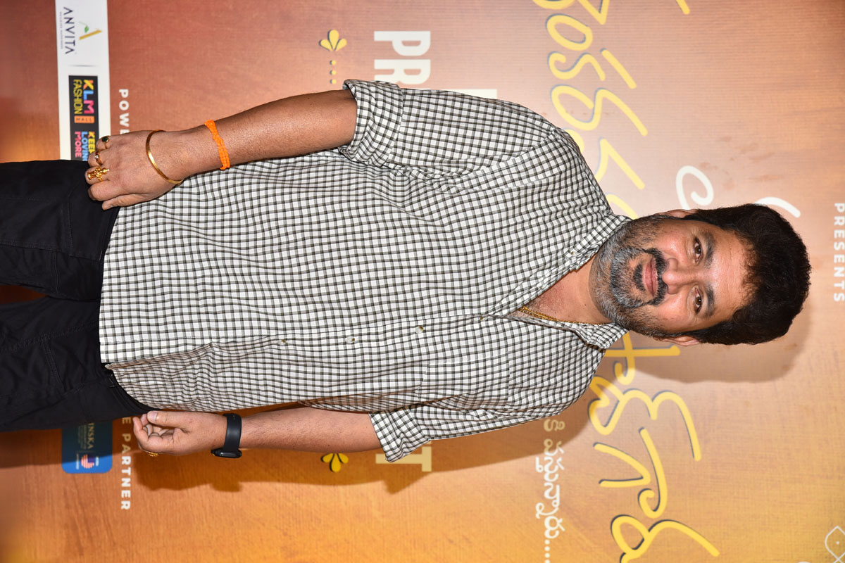 Kasarla Shyam posing for media at film event