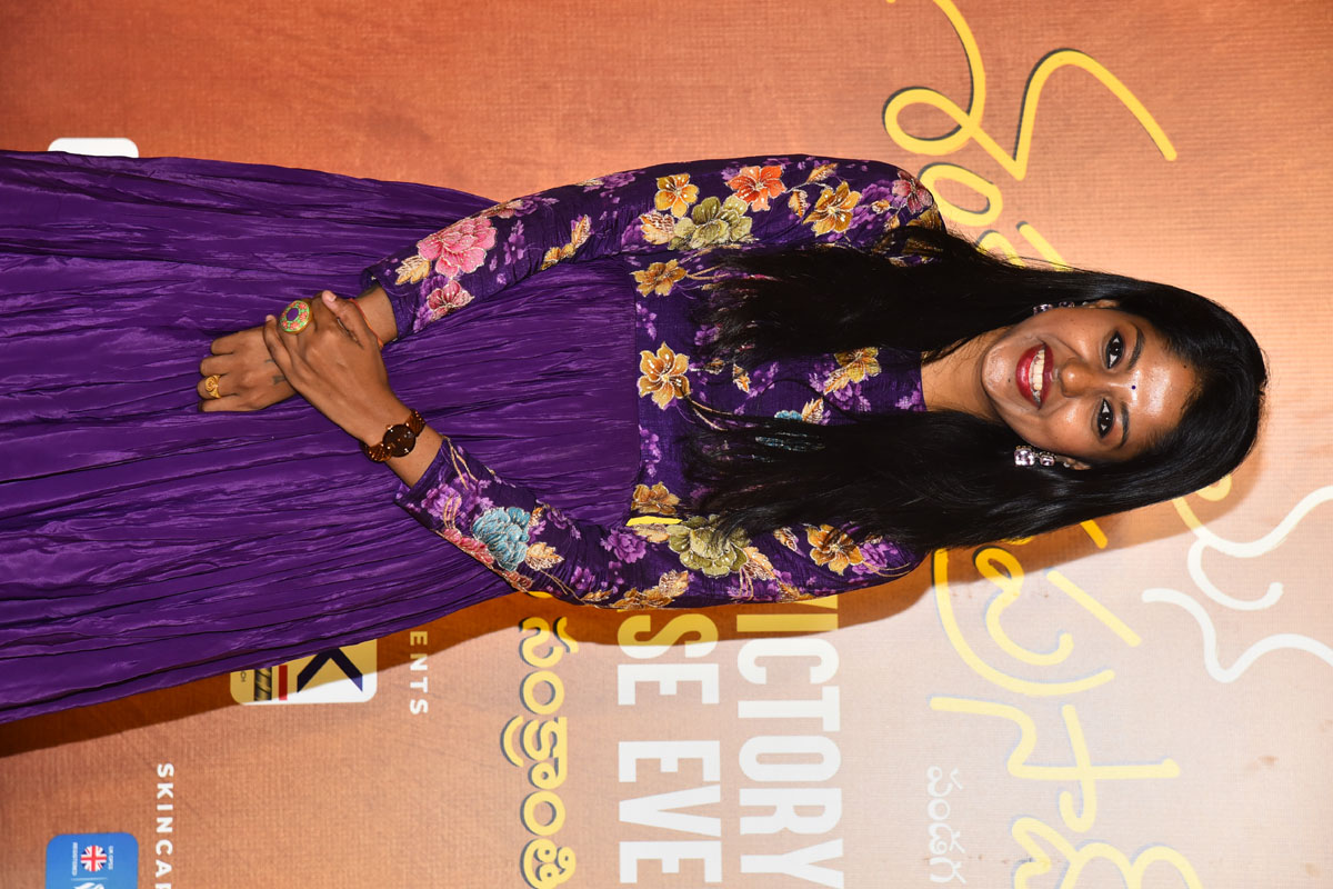 Madhu Priya posing for media at movie event