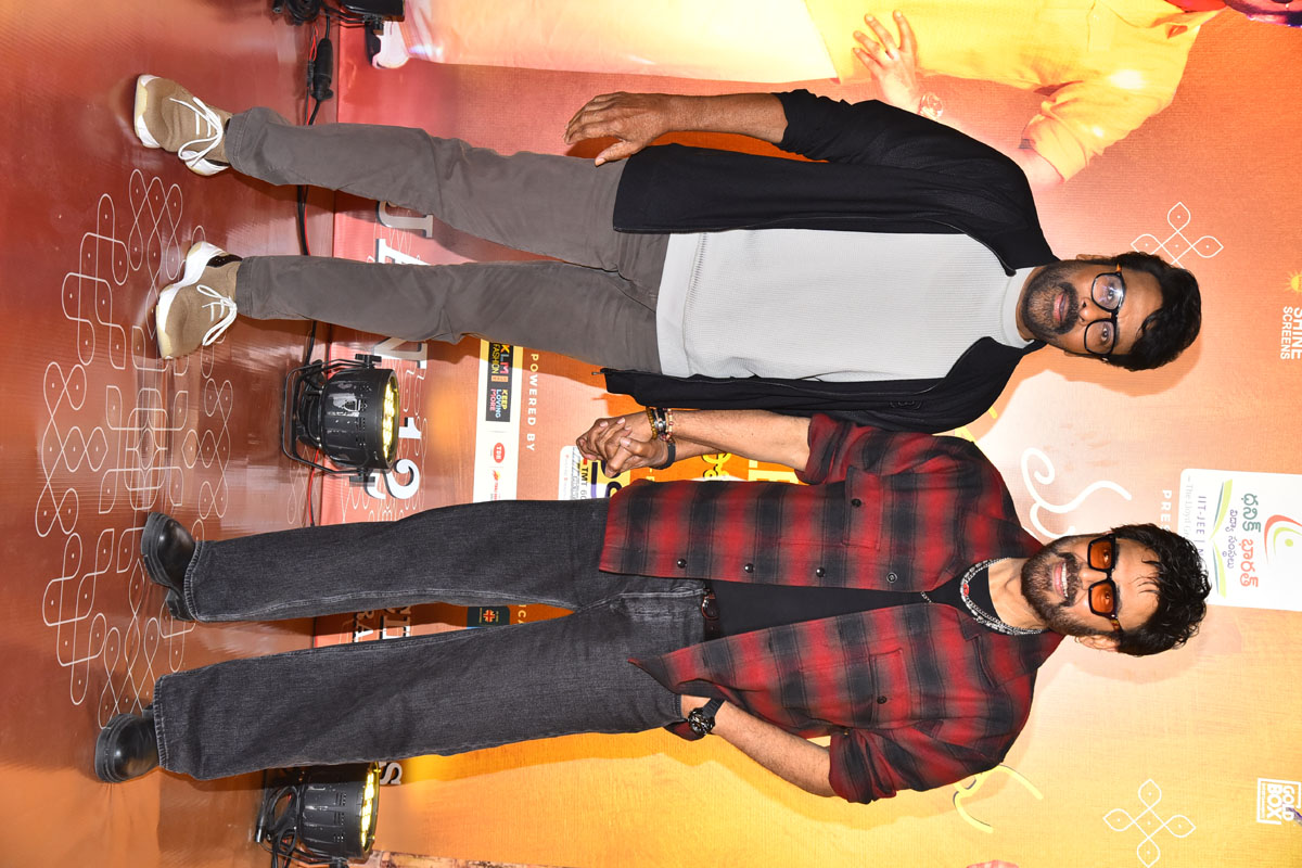 Chiranjeevi and Venkatesh posing together at event