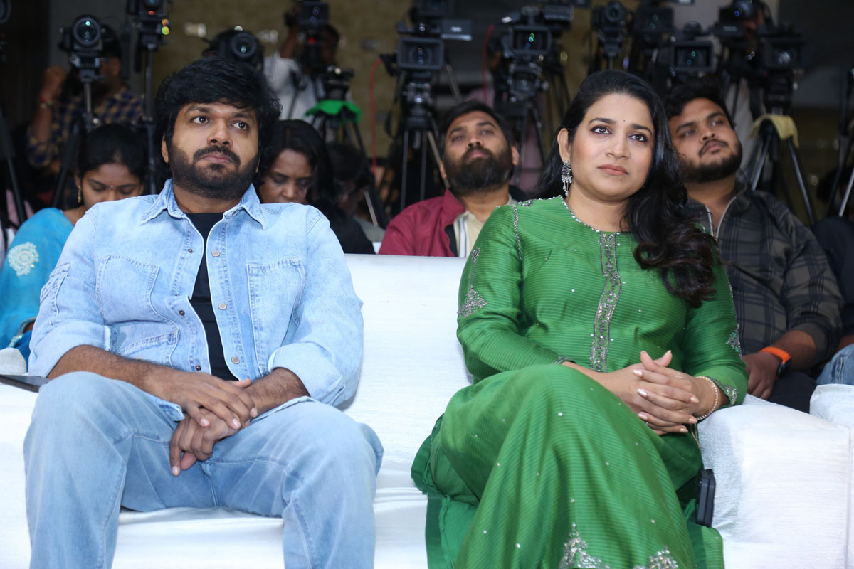 Anil Ravipudi Sushmita Konidela seated on stage