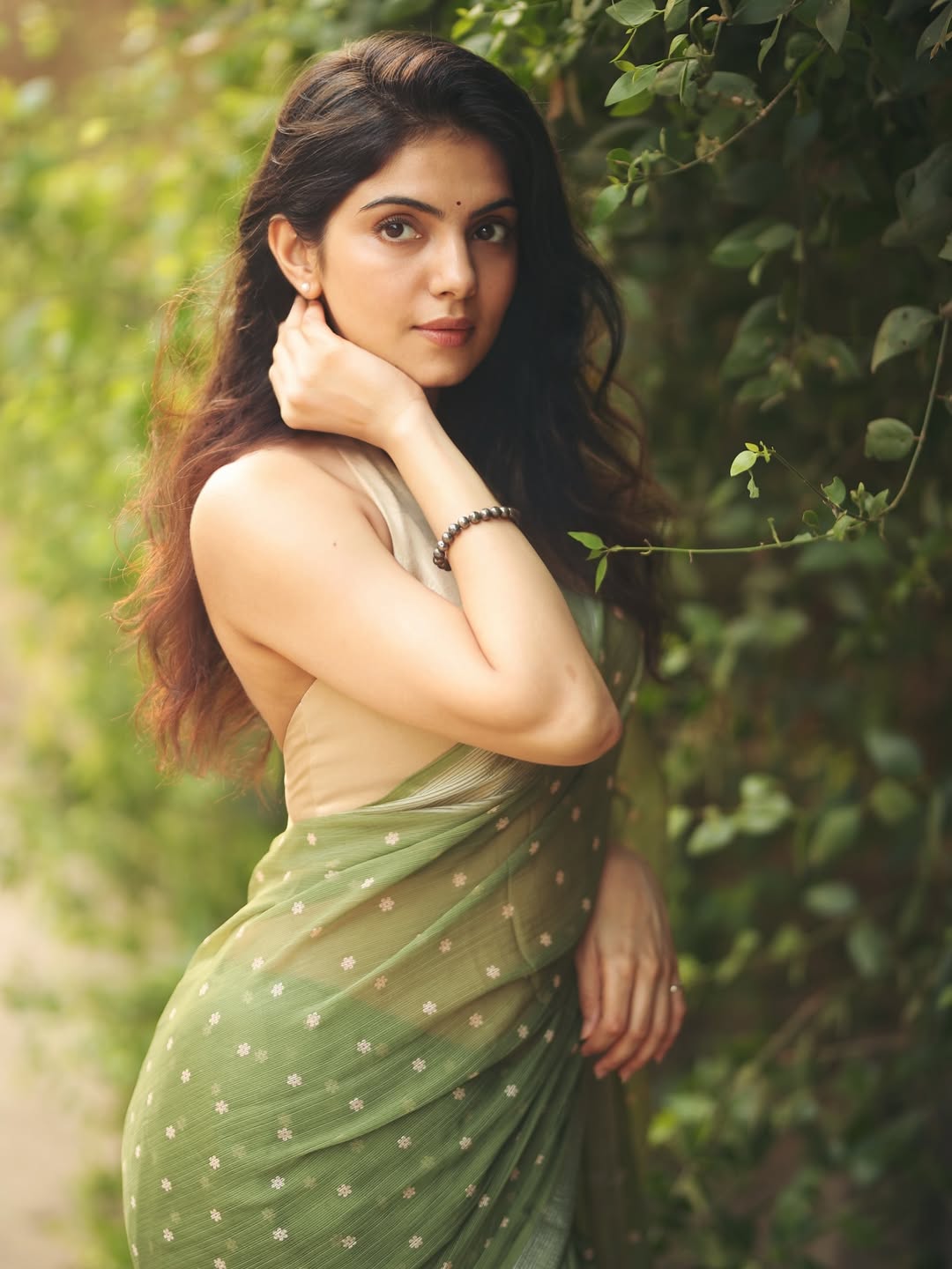 Misha Narang radiating elegance in lush green backdrop