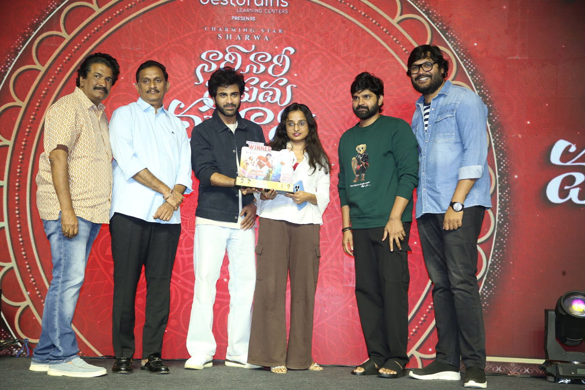 Team celebrating success on stage