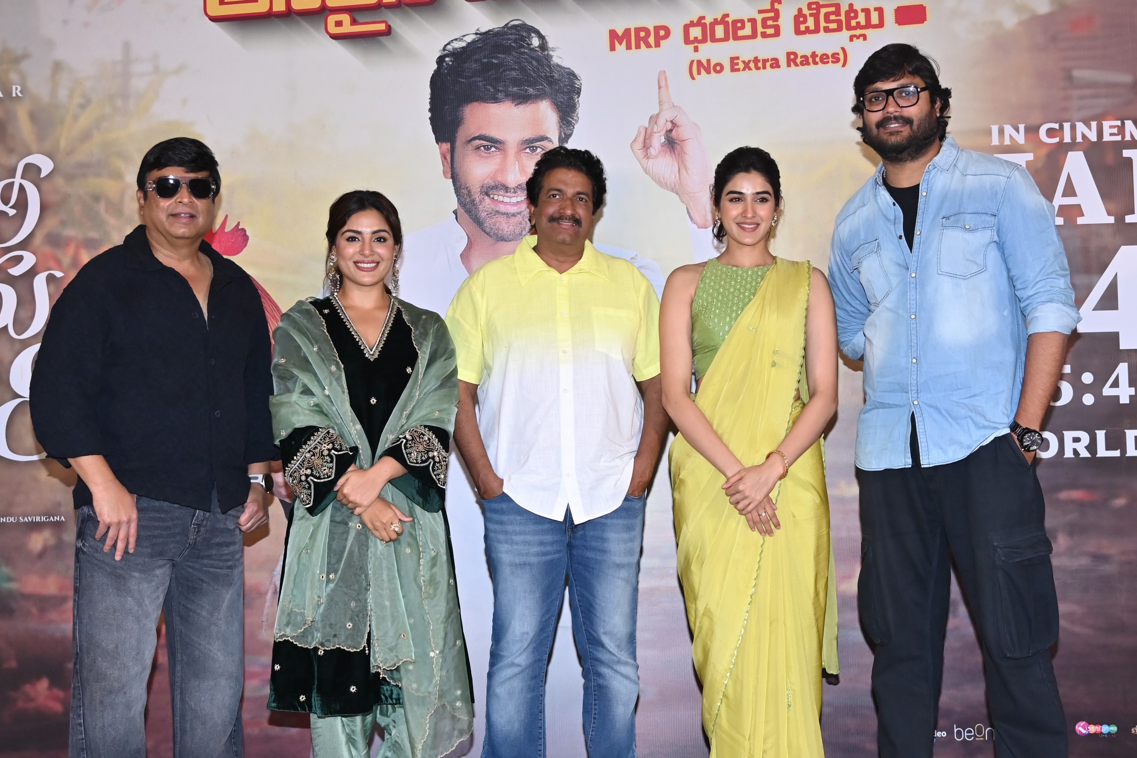 Nari Nari Naduma Murari team posing for press meet photos