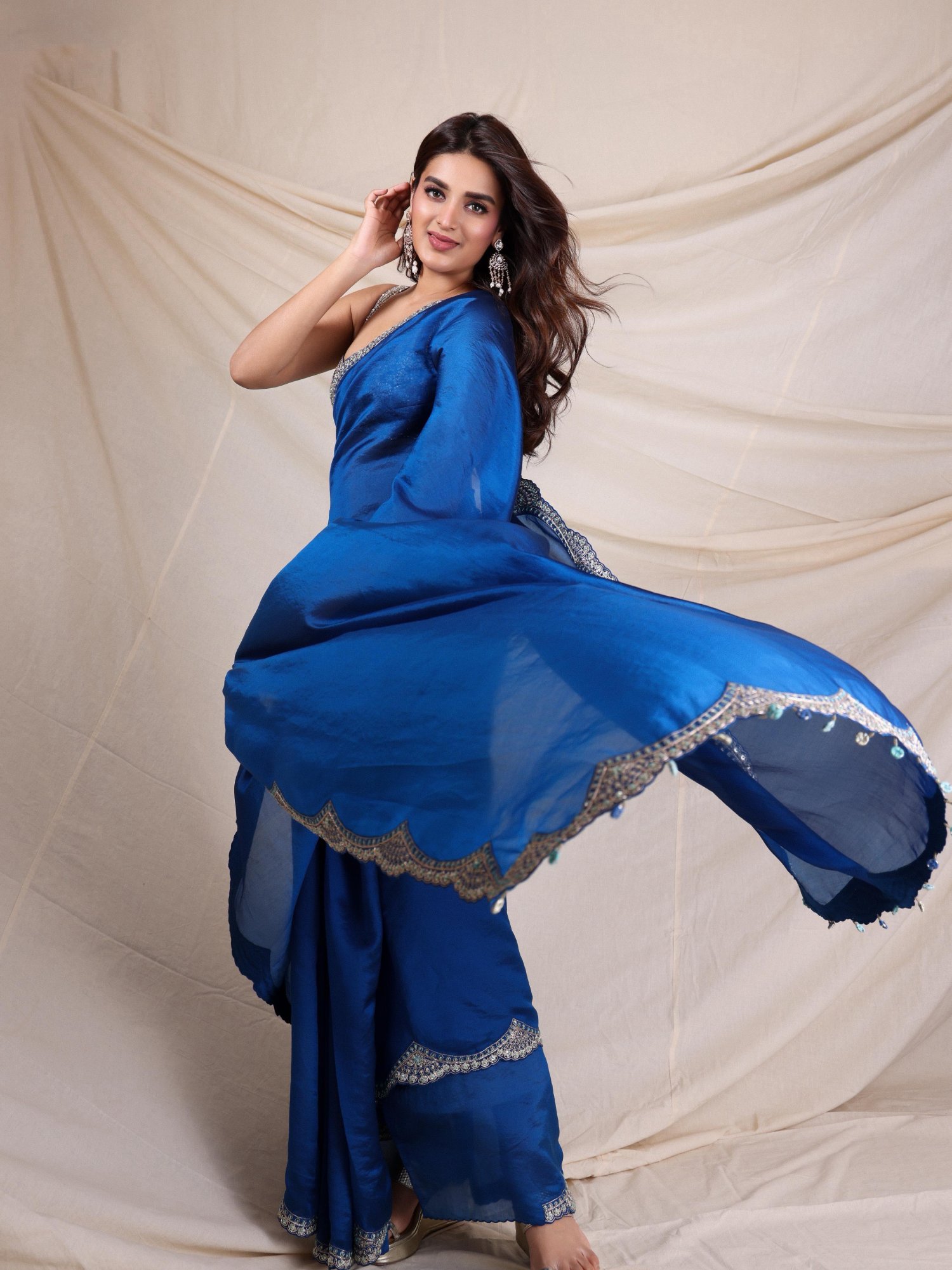 Nidhhi Agerwal blends elegance and playful blue style