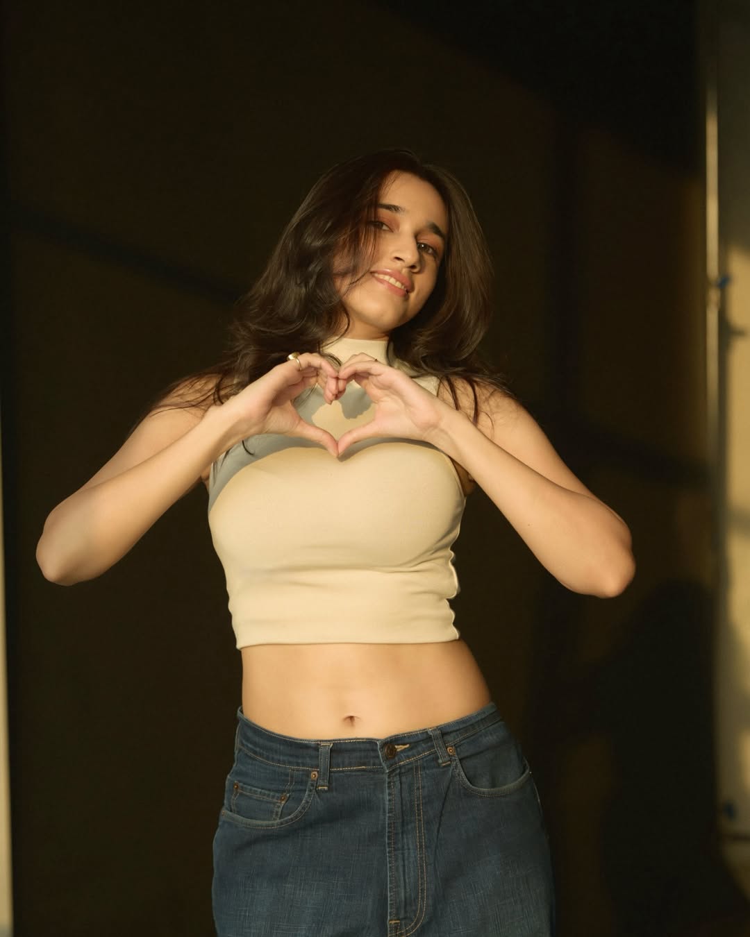 Nuveksha chic crop top style with confident smile