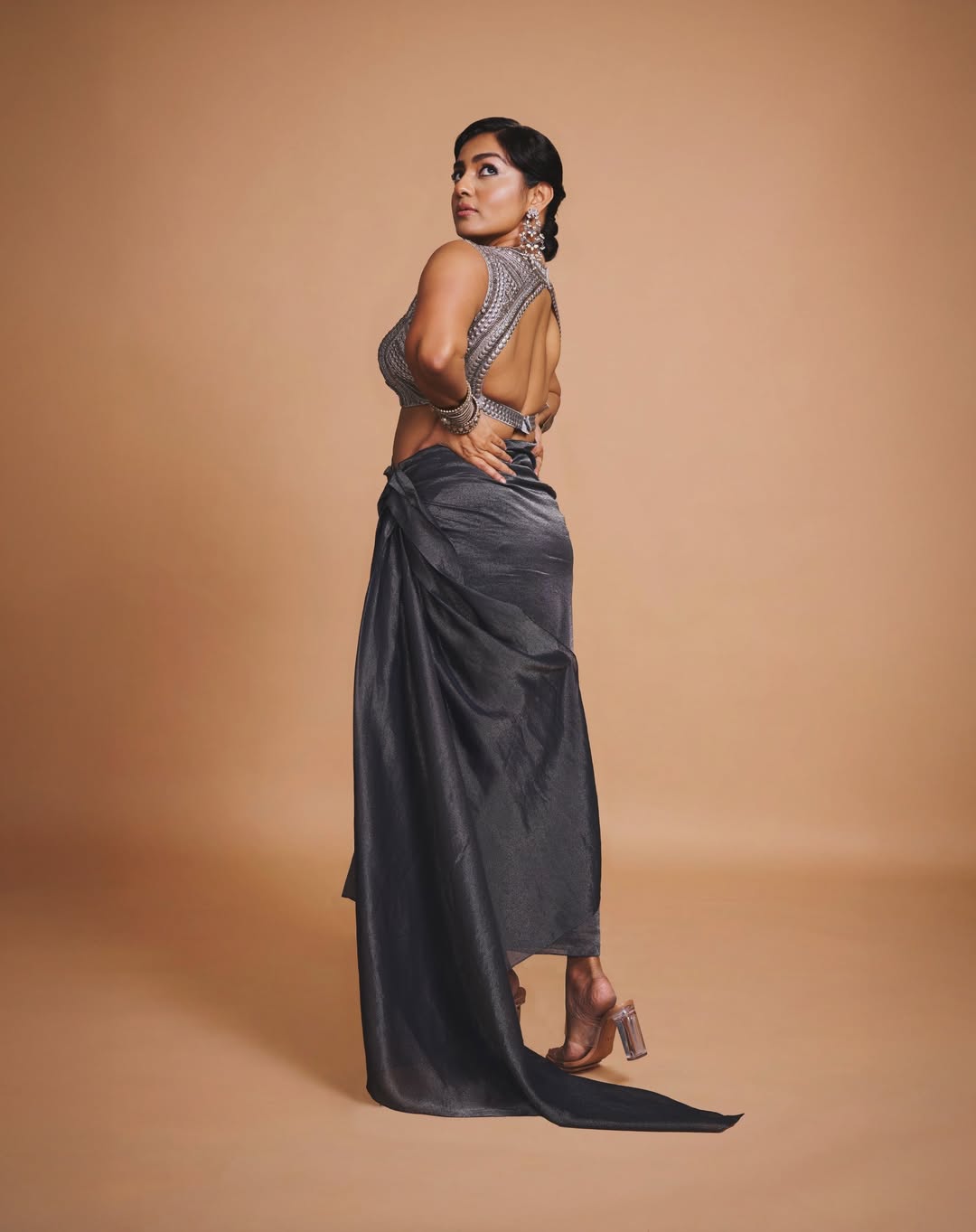 Parvathy Thiruvothu stuns in bold elegant backless attire