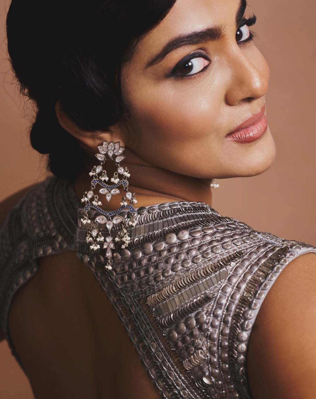 Parvathy Thiruvothu radiates silver glamour with confident attitude