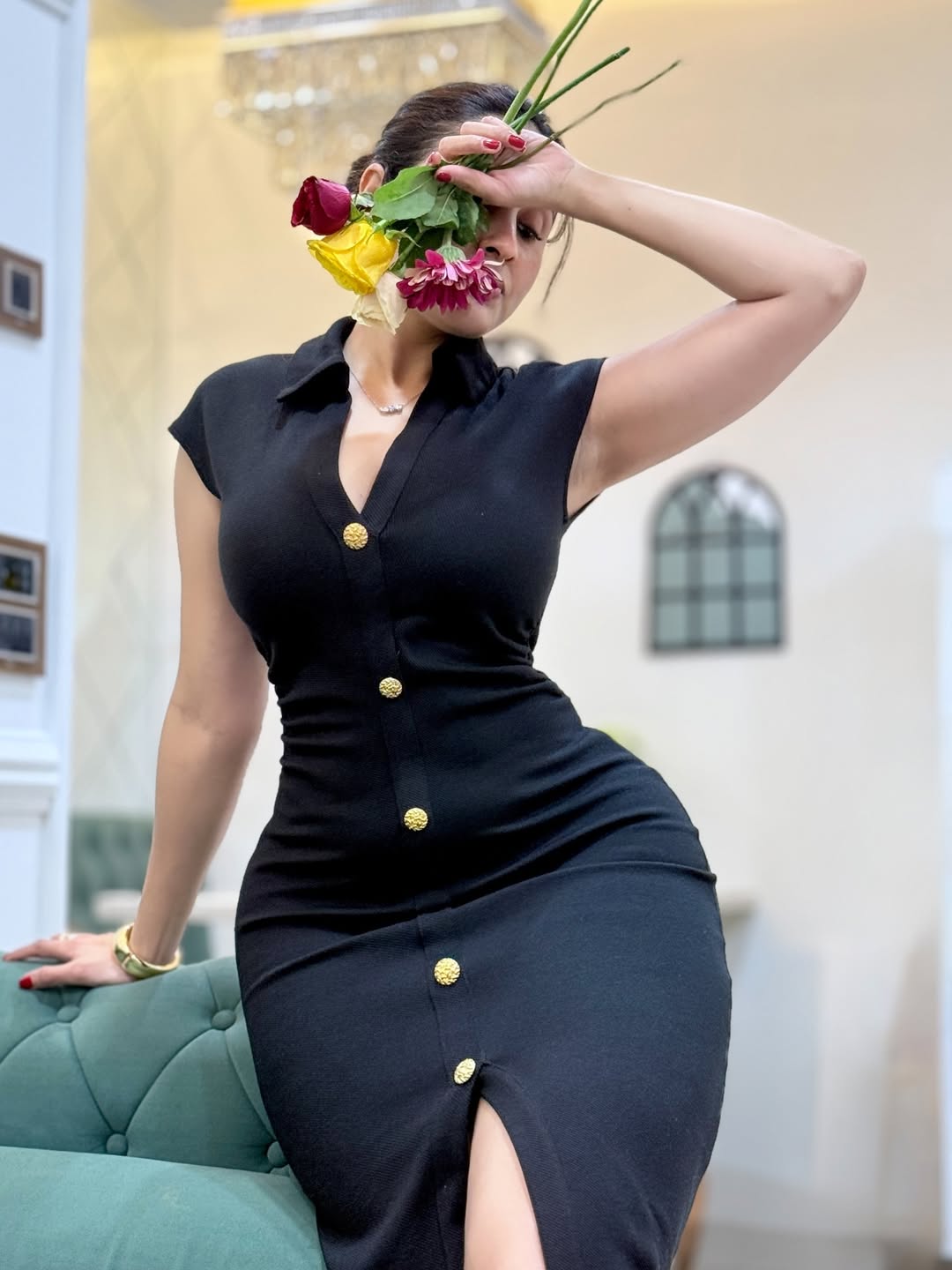 Priyanka Kholgade pairs black dress with golden accents