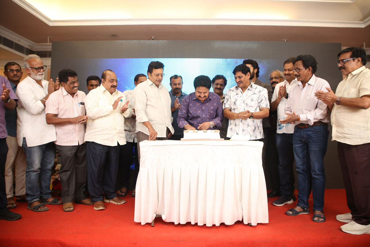 Producer Atchi Reddy cutting birthday cake