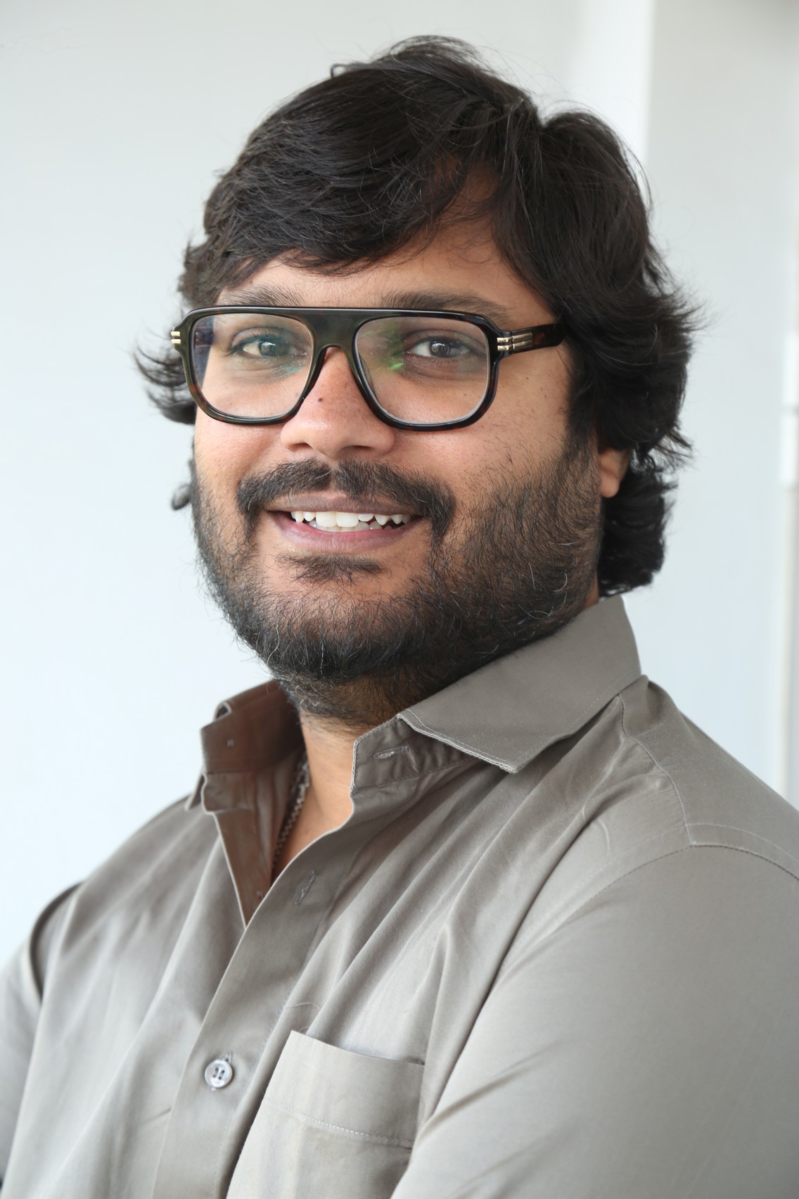 Ram Abbaraju professional look with glasses