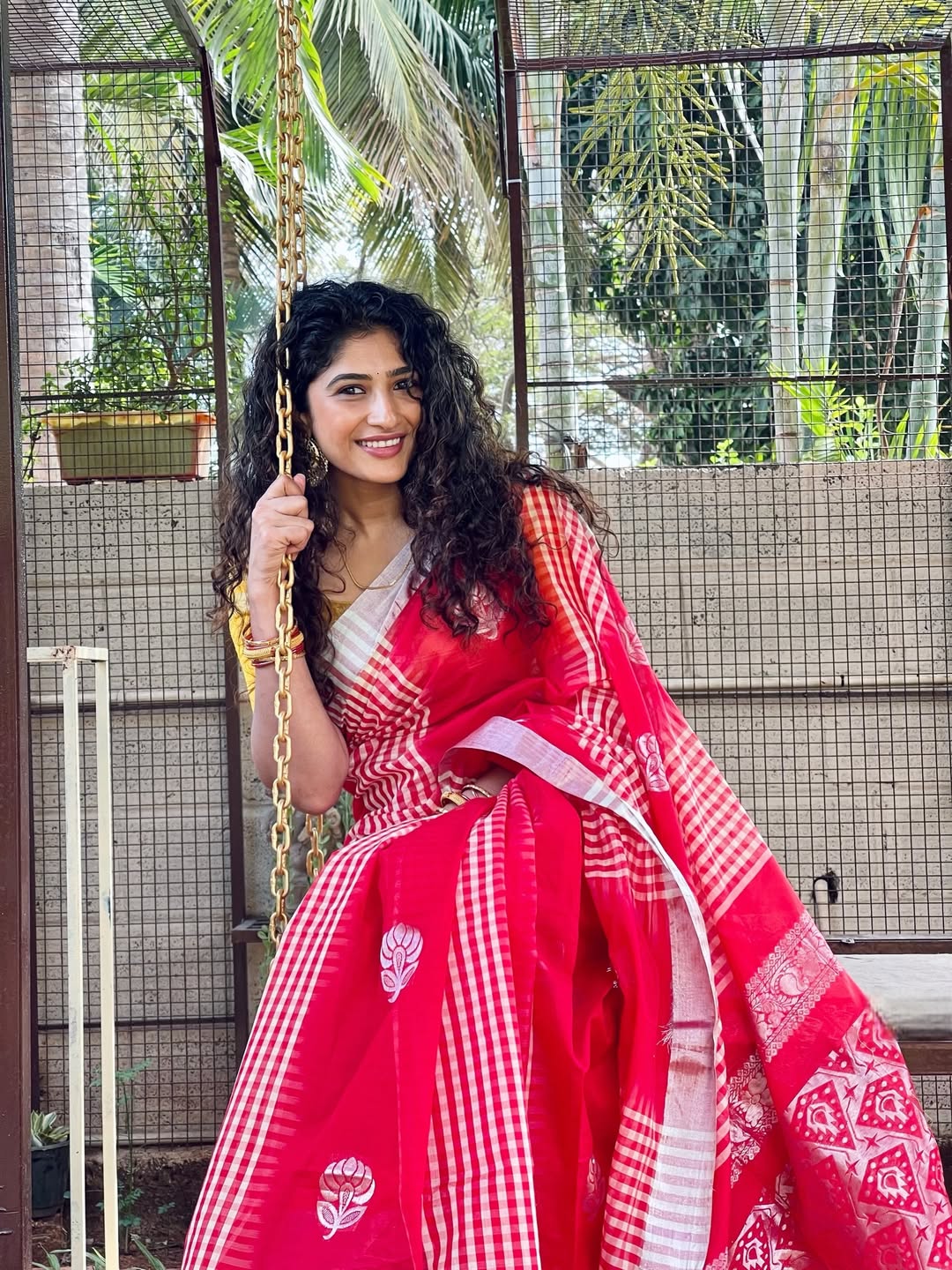 Roshni Prakash twirling in vibrant saree with elegance