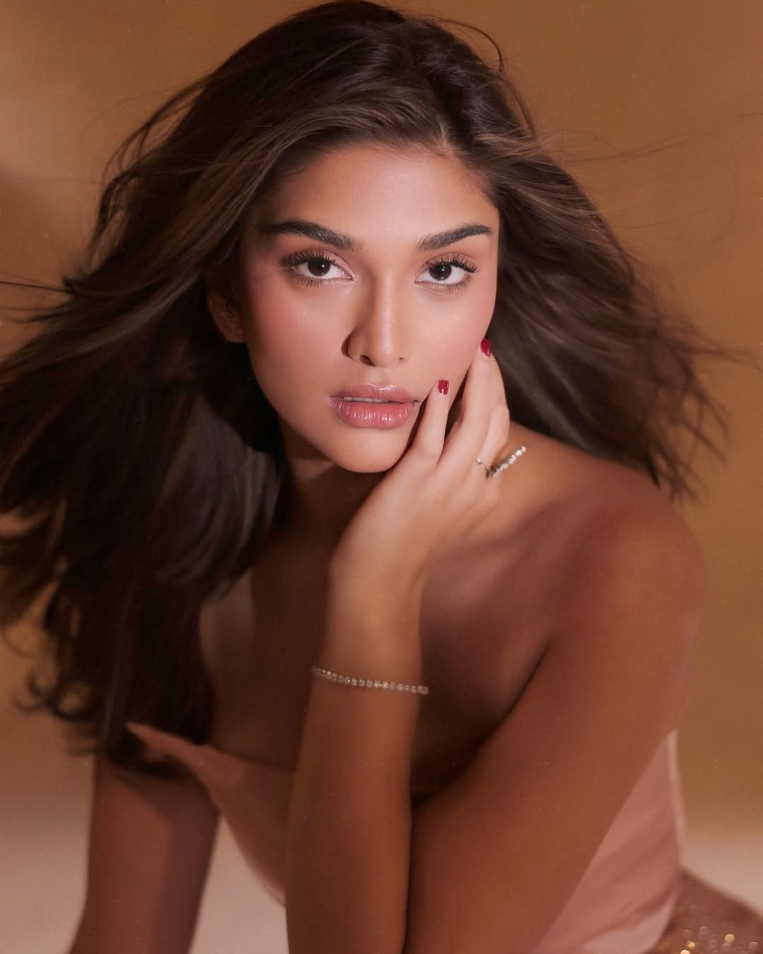 Saiee Manjrekar in elegant dress with playful confidence